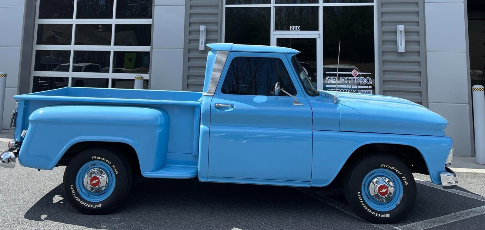 Blue classic Chevy C10 pickup outside The Tint Guy Kennesaw shop
