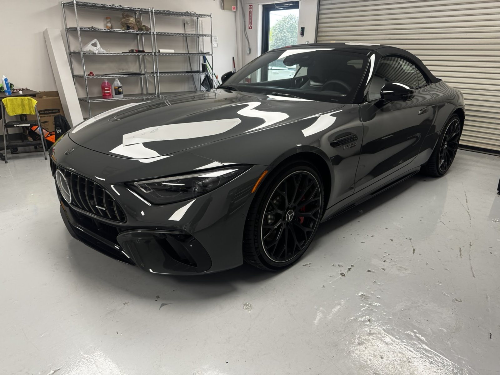 Gray Mercedes-AMG SL inside The Tint Guy shop