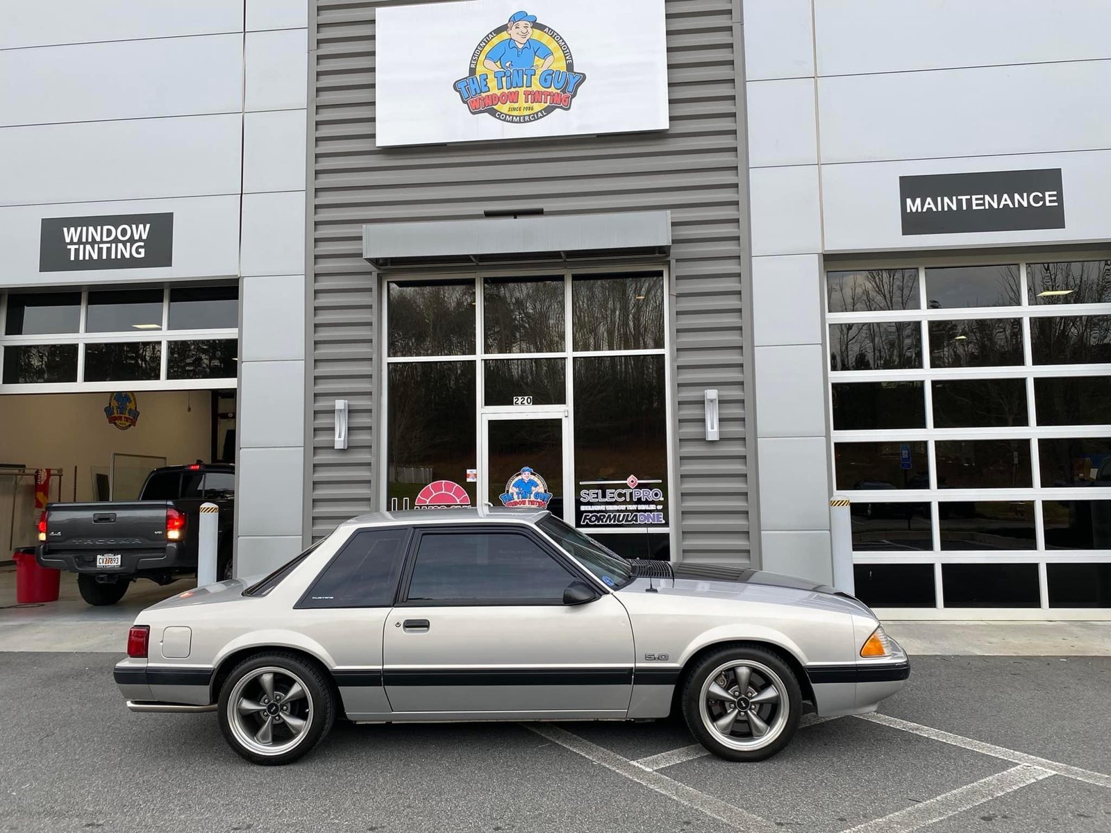 Silver Ford Mustang outside The Tint Guy Kennesaw shop